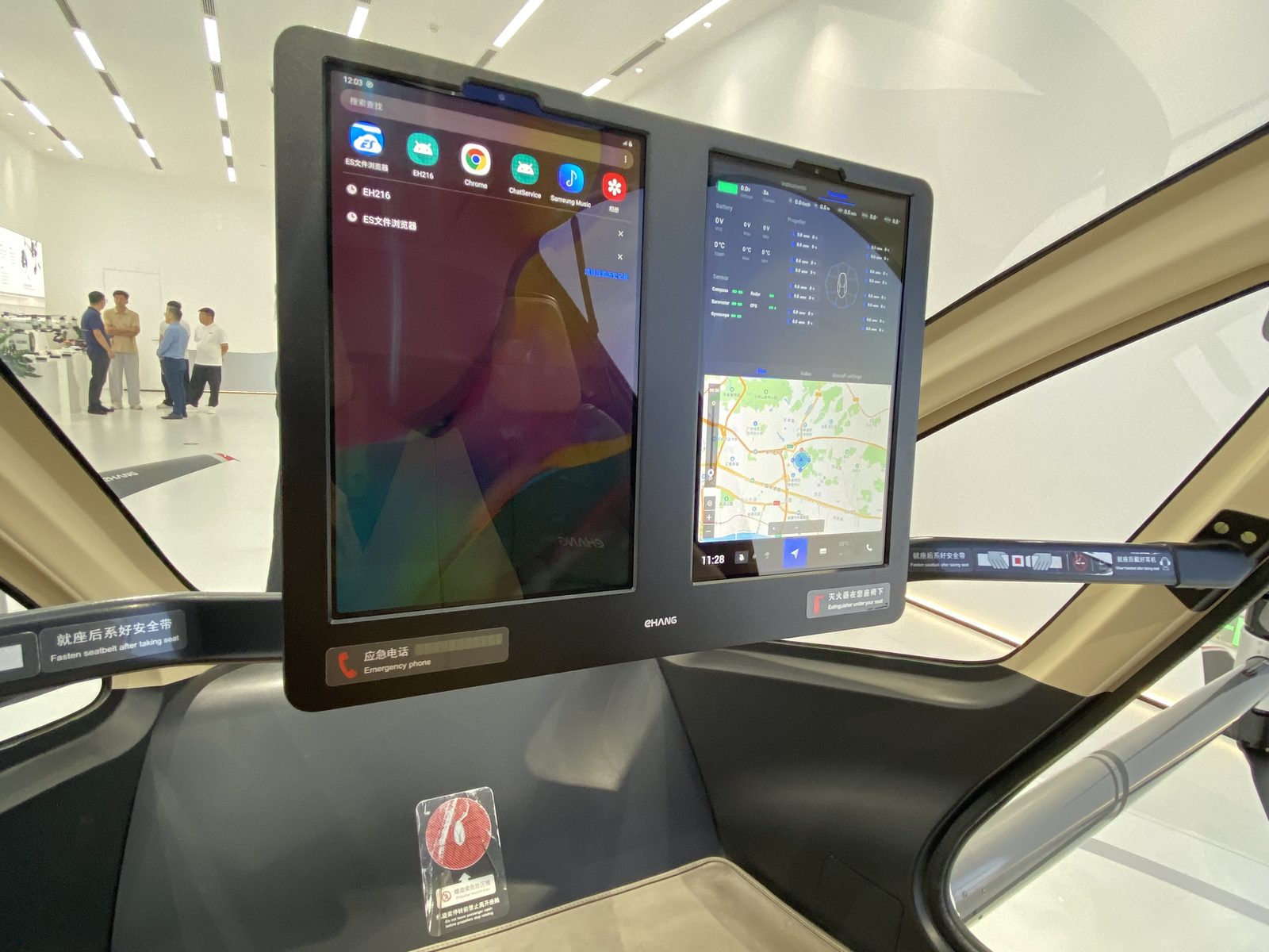 Close-up of the EH216-S dual-tablet interface showing apps, flight instruments and a map.